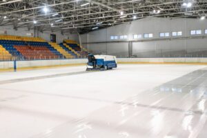 An ice resurfacer smooths the surface of an indoor ice skating rink. - Photo by Pavel Danilyuk on Pexels